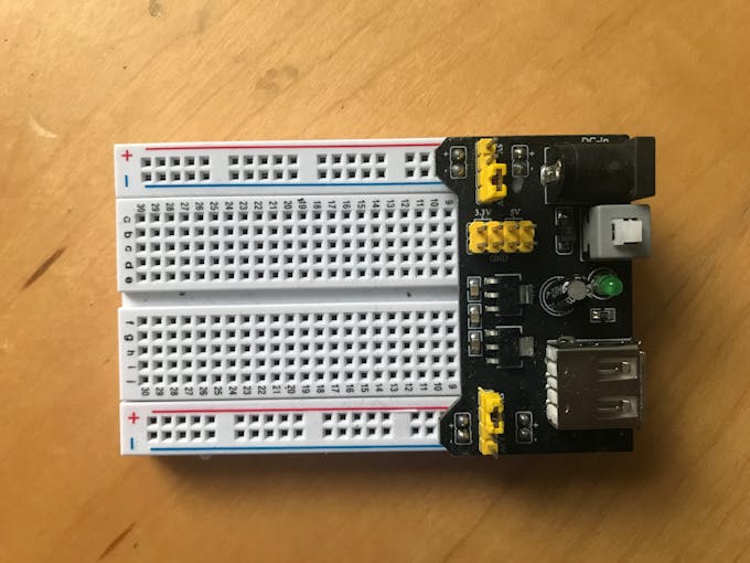 place the power supply on the breadboard