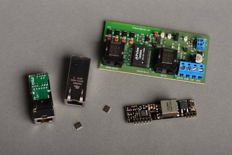 A bunch of different PoE+ PD components including two Molex PD jacks, two TI TPS2378 ICs, a TI TPS2378 evaluation board, and a Silvertel PoE+ PD 24 VDC module.