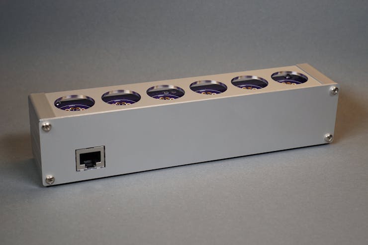 Test fit of the enclosure panels, boards, and Ethernet jack.