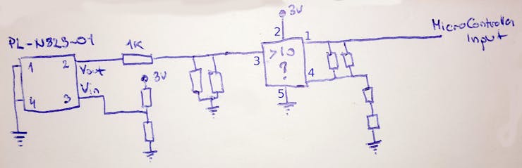The small rectangular components are resistors and capacitors. The unknown 5 pin IC is probably an op-amp.