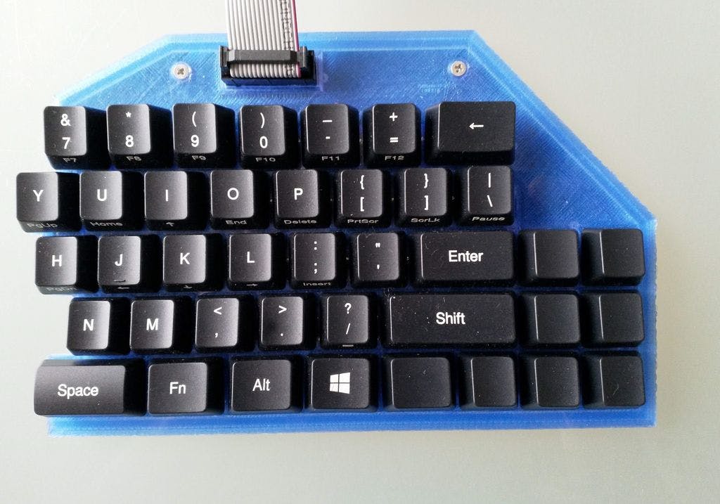 This DIY Split Mechanical Keyboard Is Controlled By a Raspberry Pi - Hackster.io
