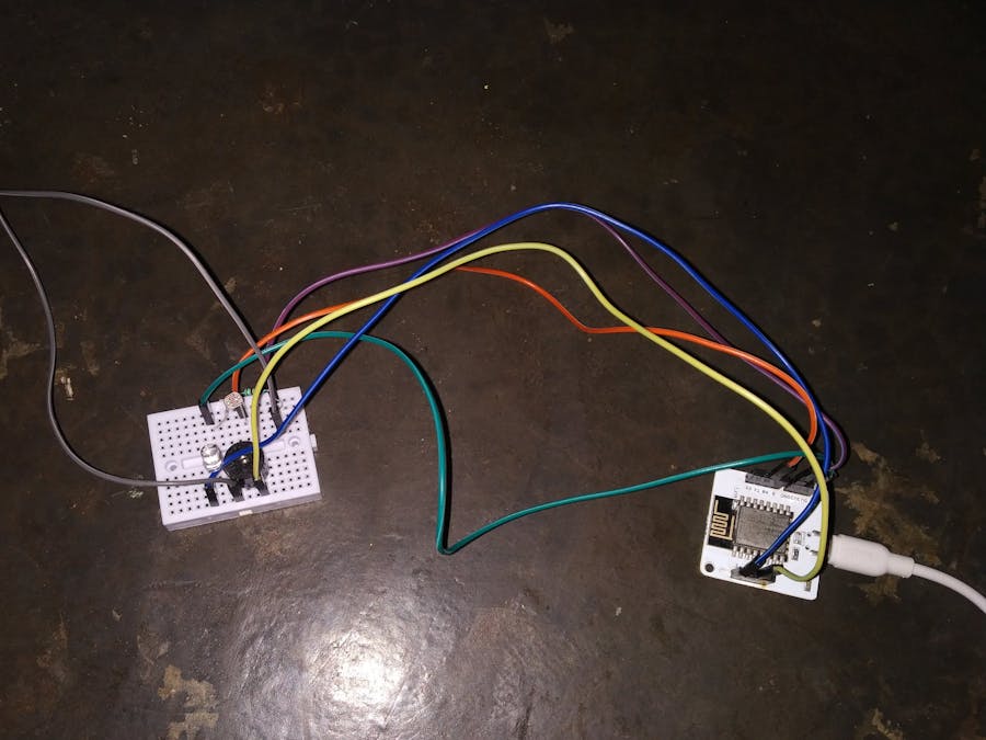 Automatic Street Light Controller with Alarm using Bolt Iot