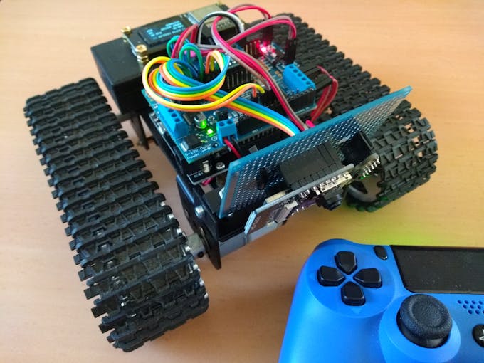 ESP32 Crawler and PS4 controller (green LED of controller indicates active front assist)