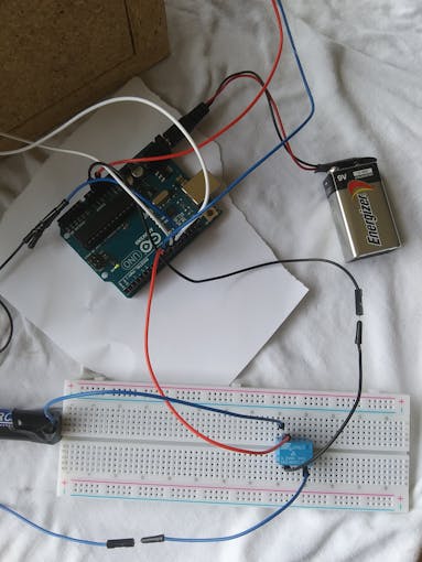 A different relay used with a breadboard and connected to the Arduino