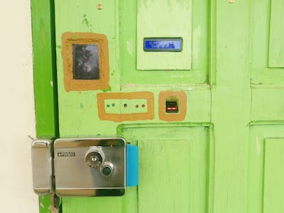 RFID and Fingerprint Based Door Lock Authentication