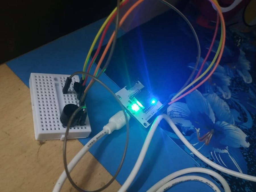 Temperature Alert via Telegram and Buzzer