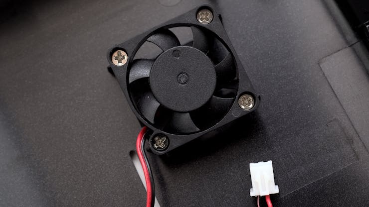 The fan offers impressive though loud cooling, but is easily installed incorrectly - as pictured.  (📷: Gareth Halfacree)