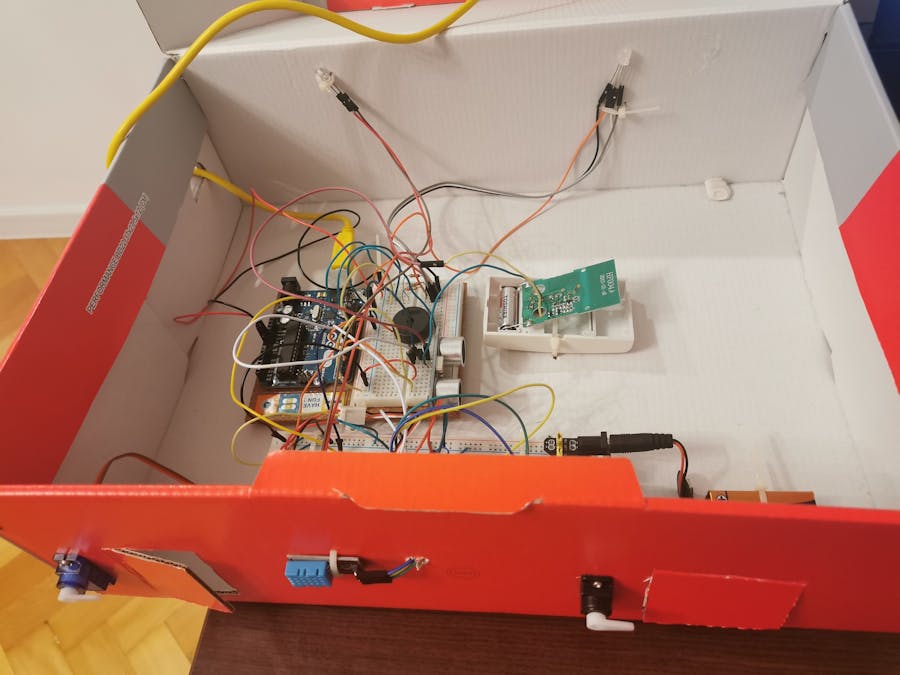 Smart House controlled by website and vocal commands