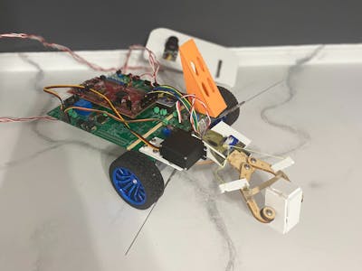 Controllable Assisted Robot Car with Robotic Gripper