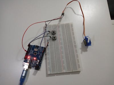 Controling servo motors with buttons and arduino