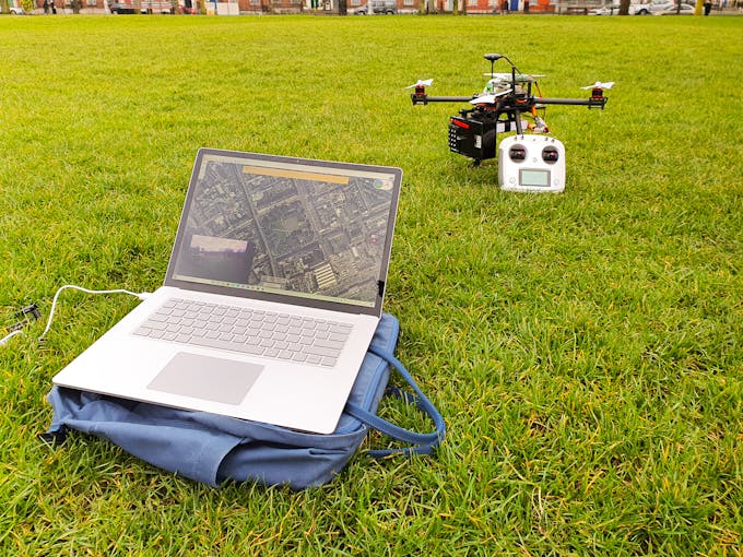 Figure 51: QGroundControl on a computer with the drone in the background