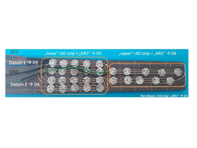 Wired fretboard of smaller ukulele (rear view)