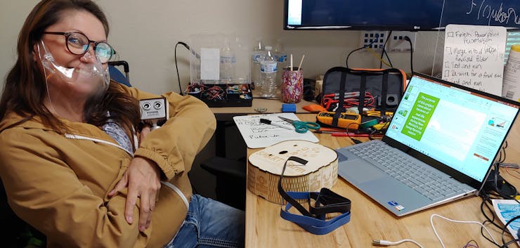 Stephanie cradling the baby