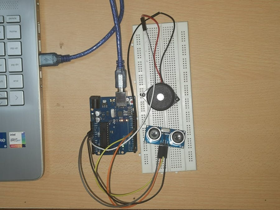 Social distance maintaining alert using ultrasonic sensor