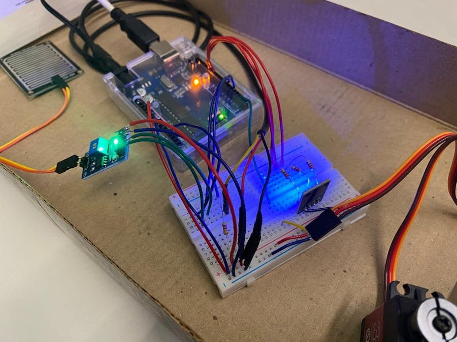 HVAC Shutter servo by temperature and raindrops sensors
