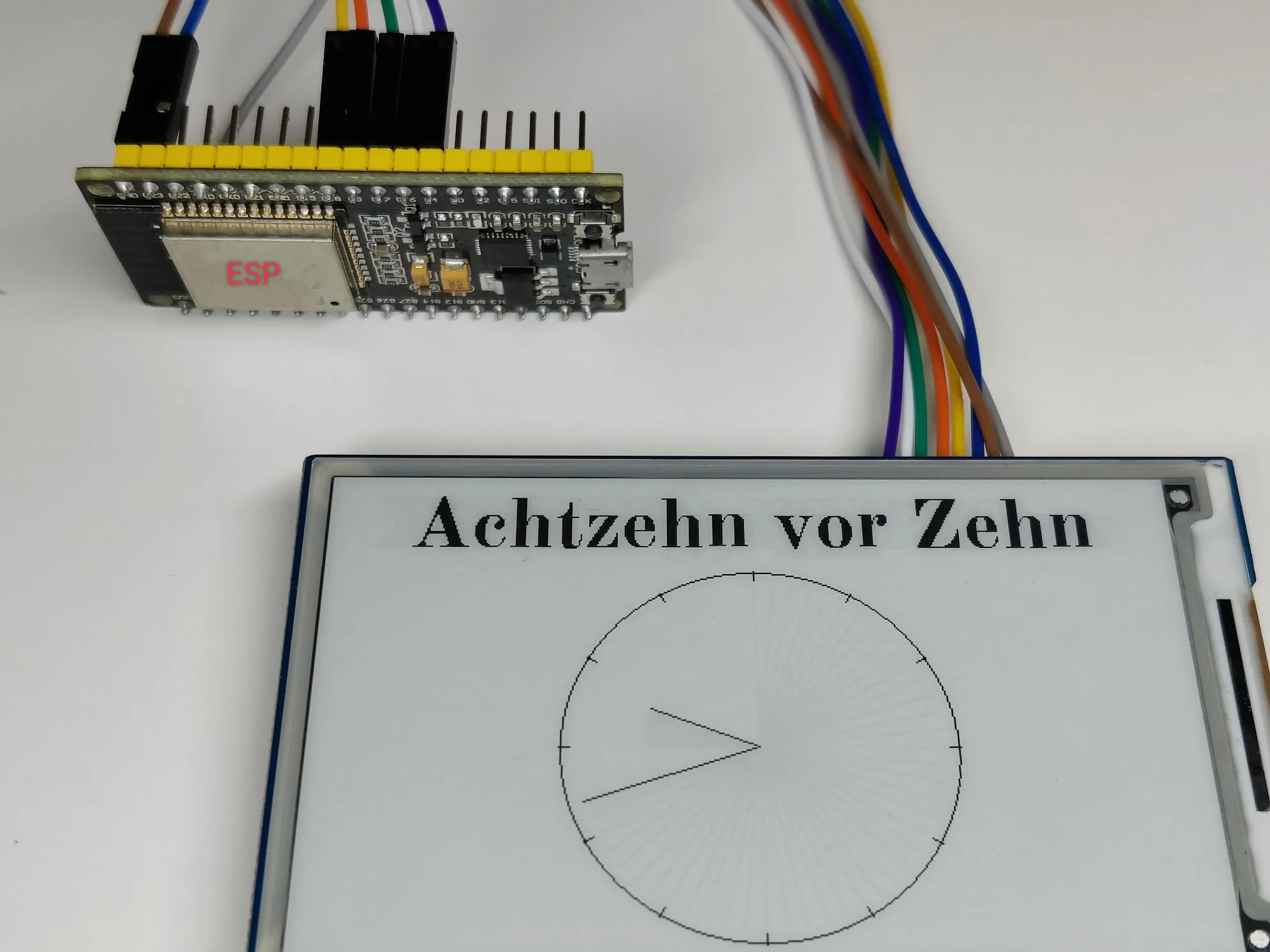 Simple fine-drawn analog and word CLOCK ON E-PAPER - Hackster.io