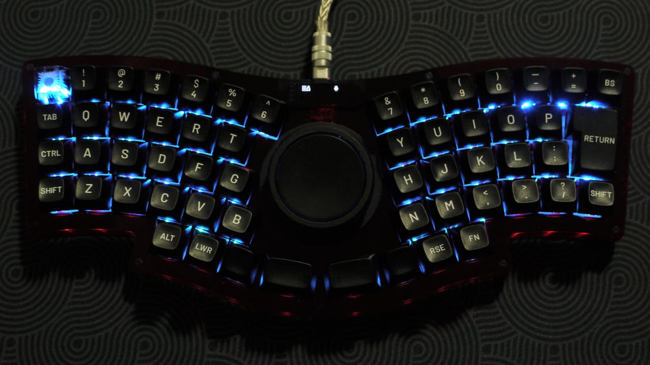 GitHub - skarrmann/umbra: 24 key ergonomic keyboard with self-encasing PCB.