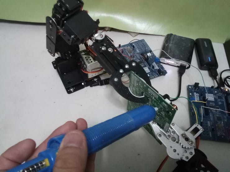 Finally we use the solder extractor to remove the component