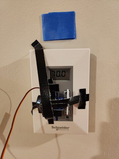 Servo motor attached to thermostat