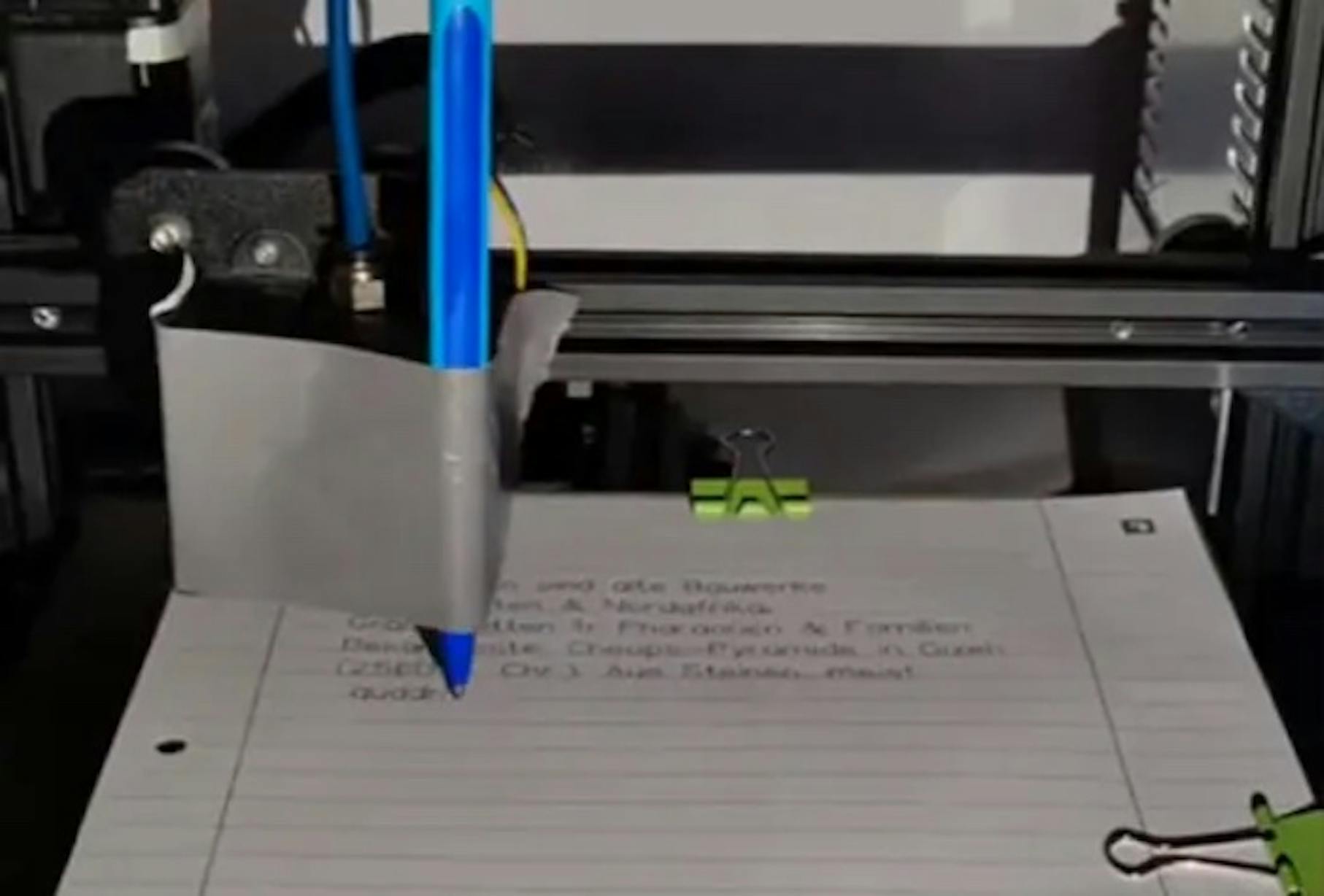 Student uses writing robot for assignment 