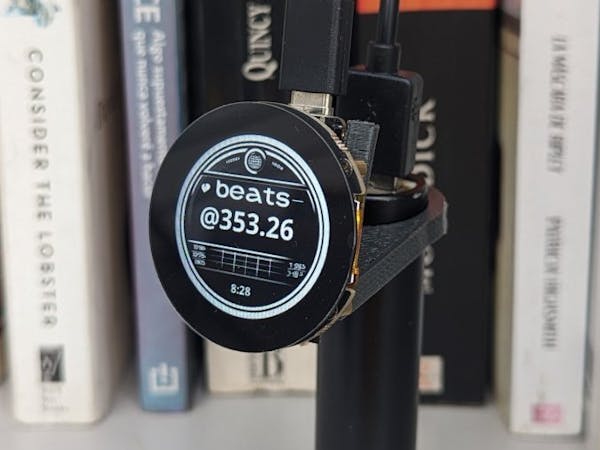 Read more about the article Roni Bandini’s Nordic nRF52840 Desk Clock Brings Again Web Time, Counts the .Beats of the Day