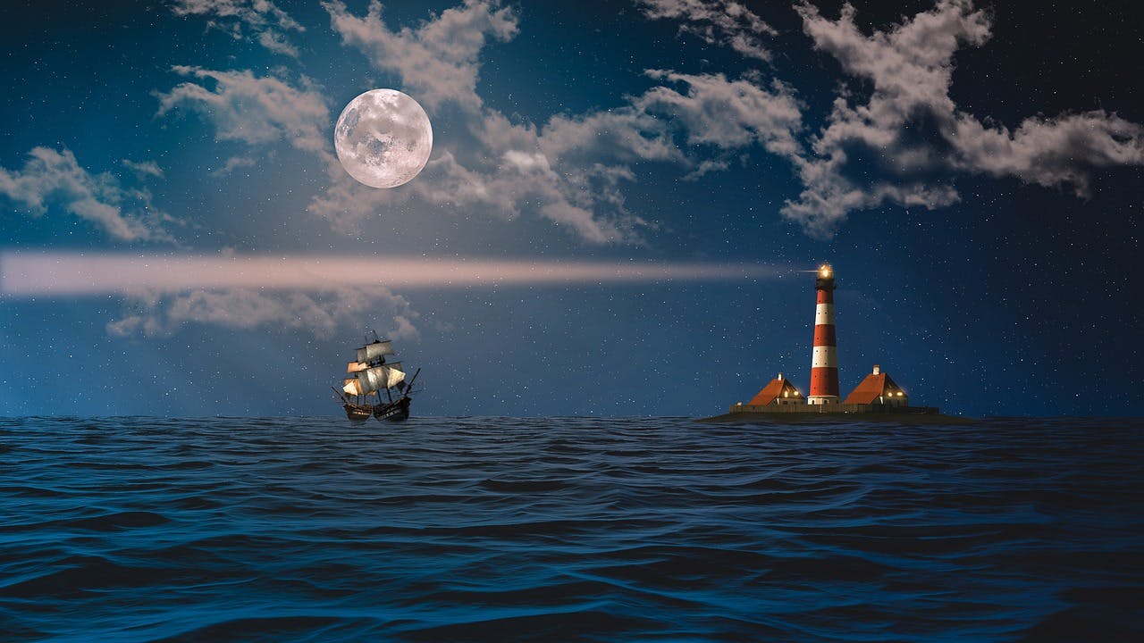 Lighthouses emit light signals to warn ships of hazards or to mark navigational points. (Pixabay.com)