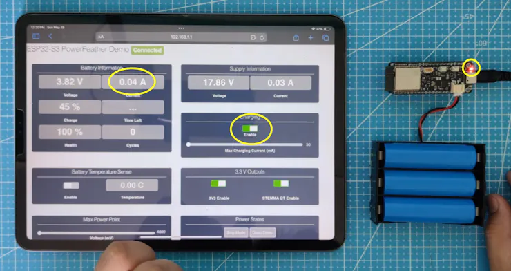 Charging enabled, red CHG LED lights up, battery current is positive, non-zero value