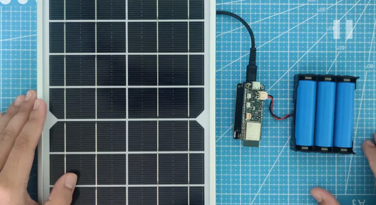 Solar panel and battery connected to ESP32-S3 PowerFeather