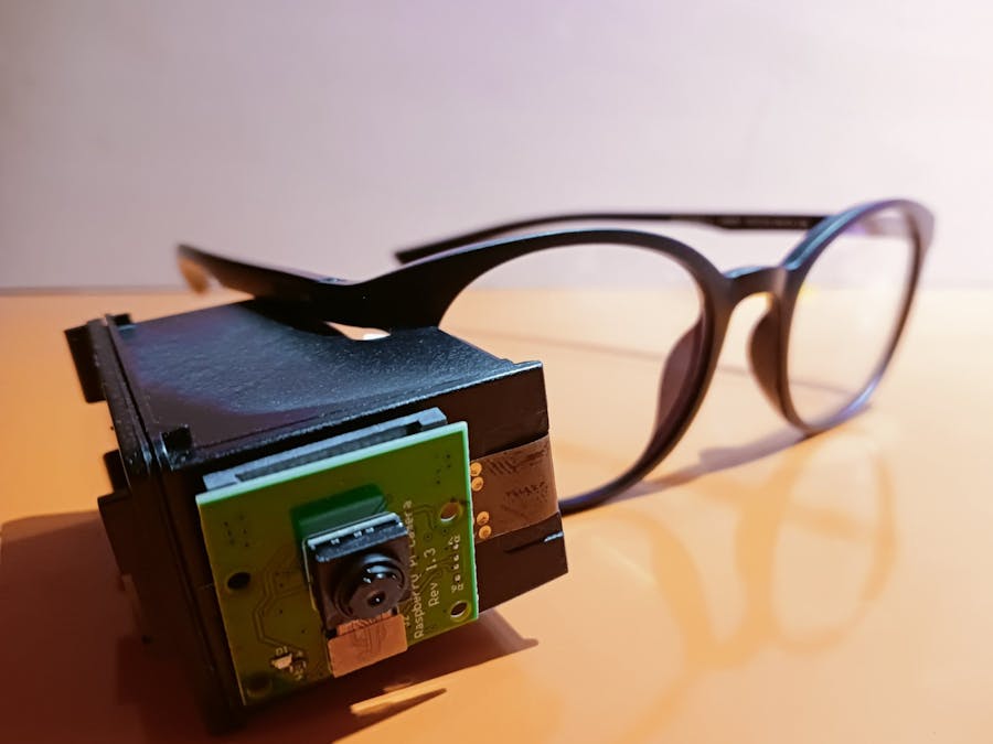 AURA: Smart Specs Attachment for Blind Students