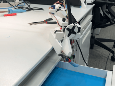 DeskSweeper: A robot that cleans your desk automatically