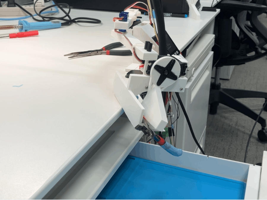 DeskSweeper: A robot that cleans your desk automatically
