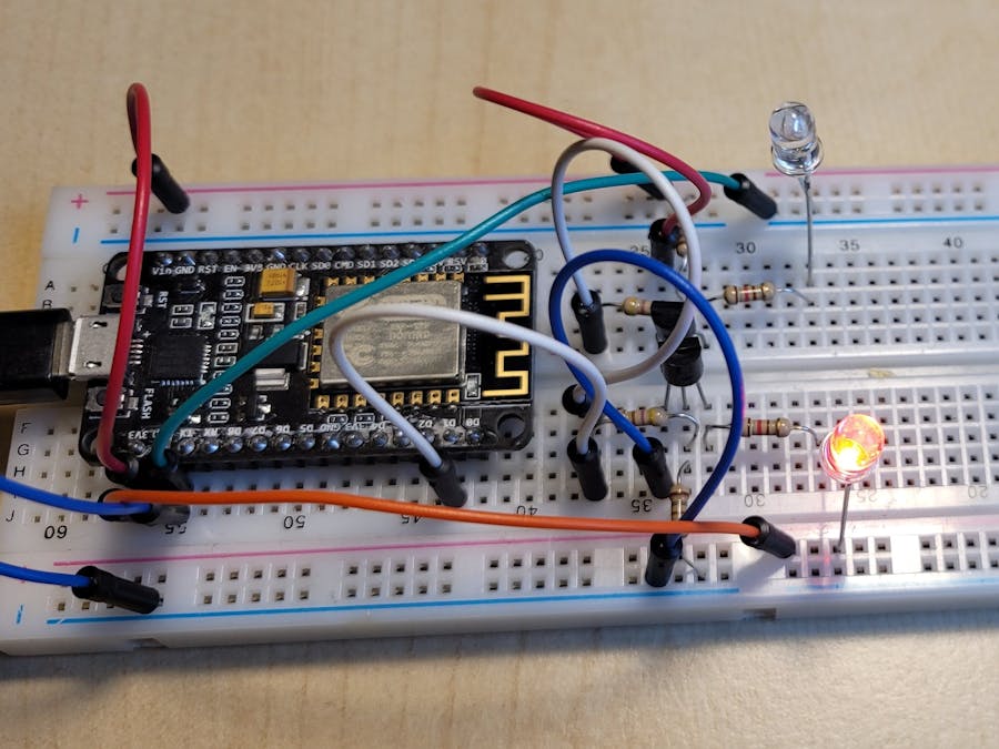 Control two loads with a single pin