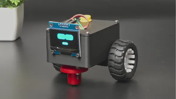 A Companion Robot That Roams Your Desk Until You Pet It