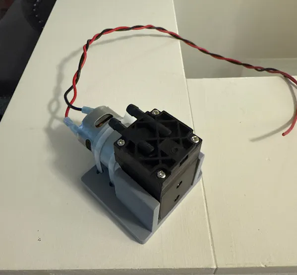 Vacuum Pump with 3D Printed Mount