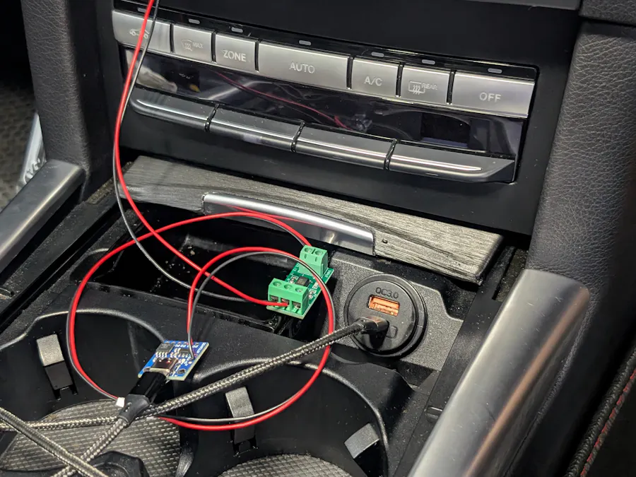 Automatic car console button pusher