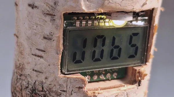 Chris Combs' Latest Artwork Tells a Six-Minute Climate Change Story on a Four-Digit LCD Display