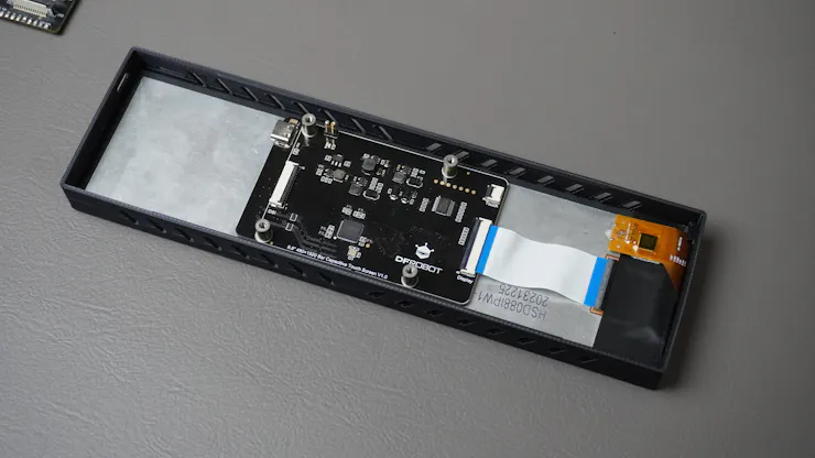 ESP32-P4 and display mounted in enclosure