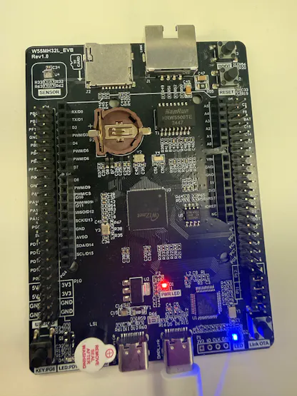 Picture of W55MH32L_EVB Board Connected to Laptop