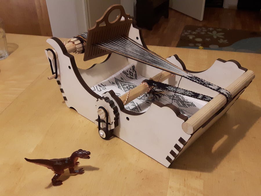 Laser cut plywood bandweaving loom