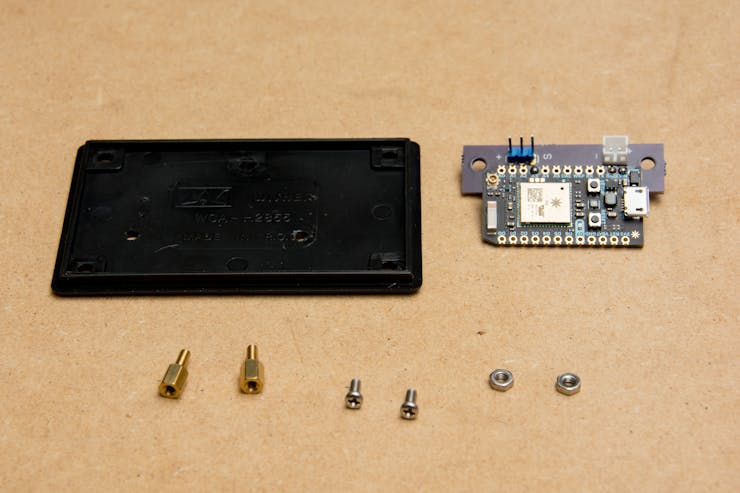 All the pieces we need to mount the PCB to the bottom plate.
