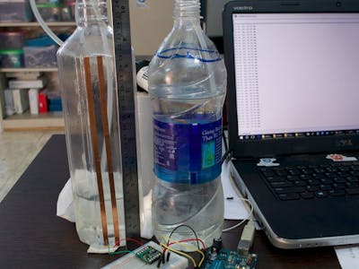 Non-contact Capacitive Liquid Level  Sensing using FDC1004