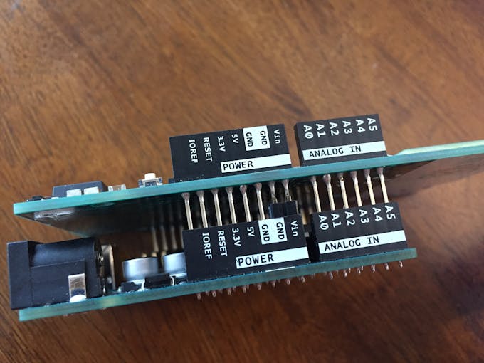 Closeup of header pins used for power with GSM shield pins pushed back