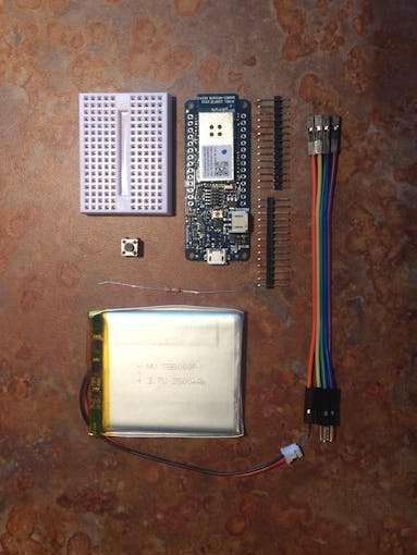 Arduino MKR1000 w/ header pins, push button, female-male jumpers, resistor LiPo battery, breadboard