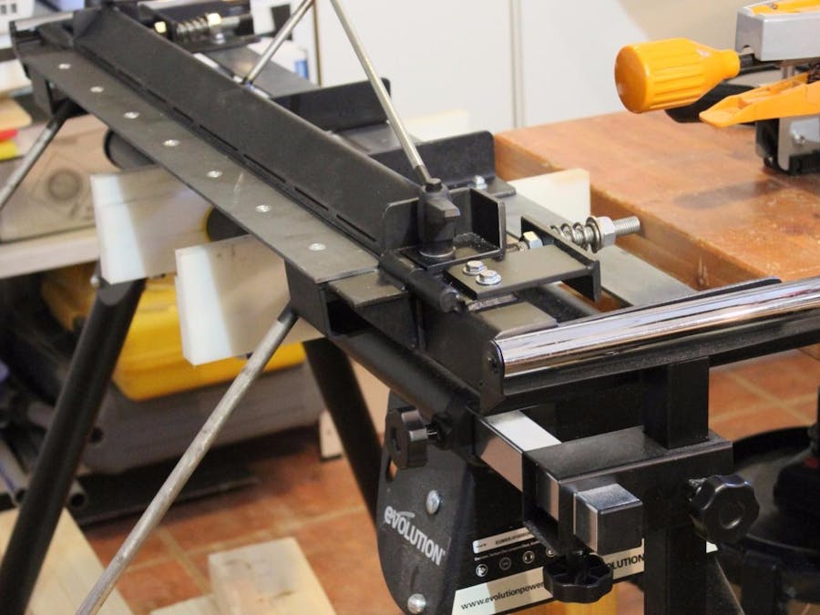 Sheet metal bending brake with radius adjustment.