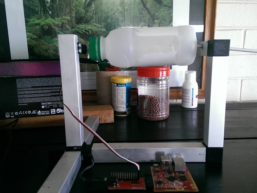 Fish Feeder and Watering System