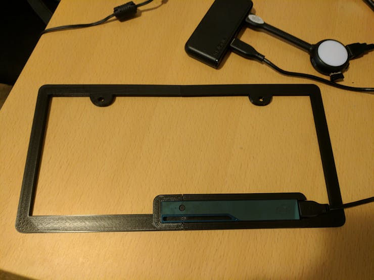3D printed Custom License plate with camera on it.
