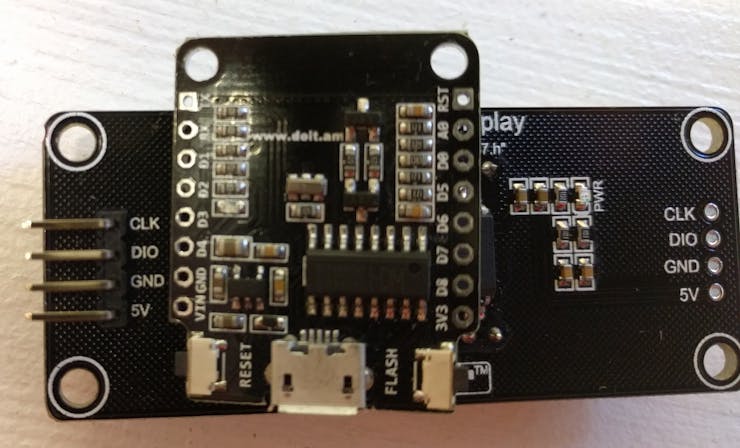 NodeMCU Mini on top of the display