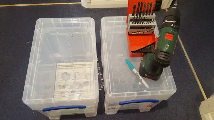 Drilling the 4 corner holes using an acrylic templape