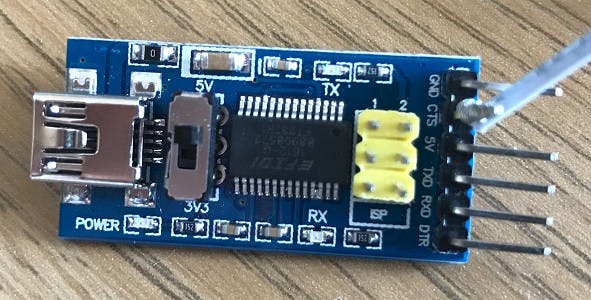 FTDI breakout board with CTS pin bent out and a wire attached.