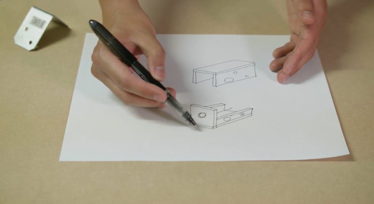 Sketch of the housing concept. Metal mounting bracket on the left